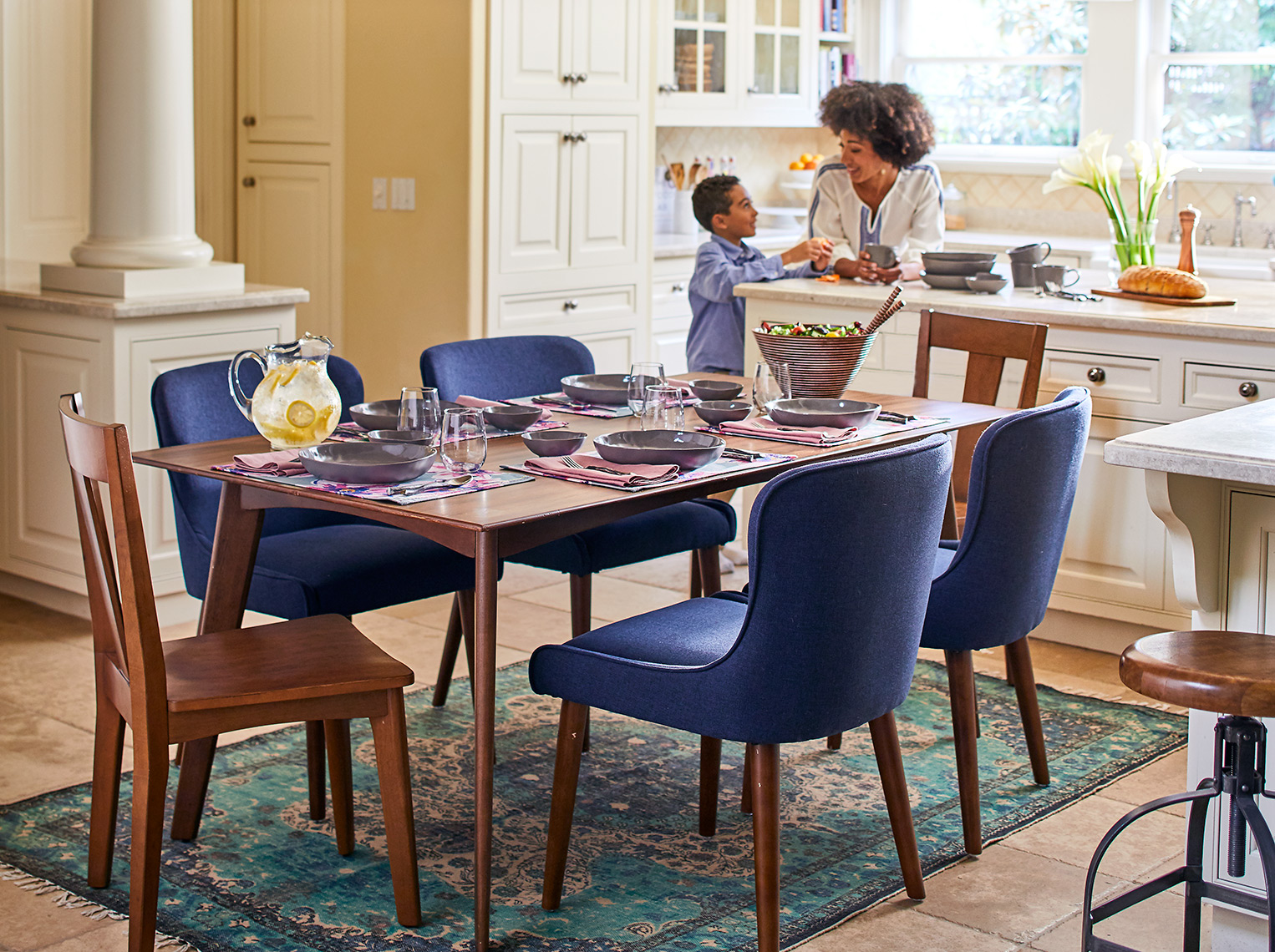 Kitchen table with mom and son